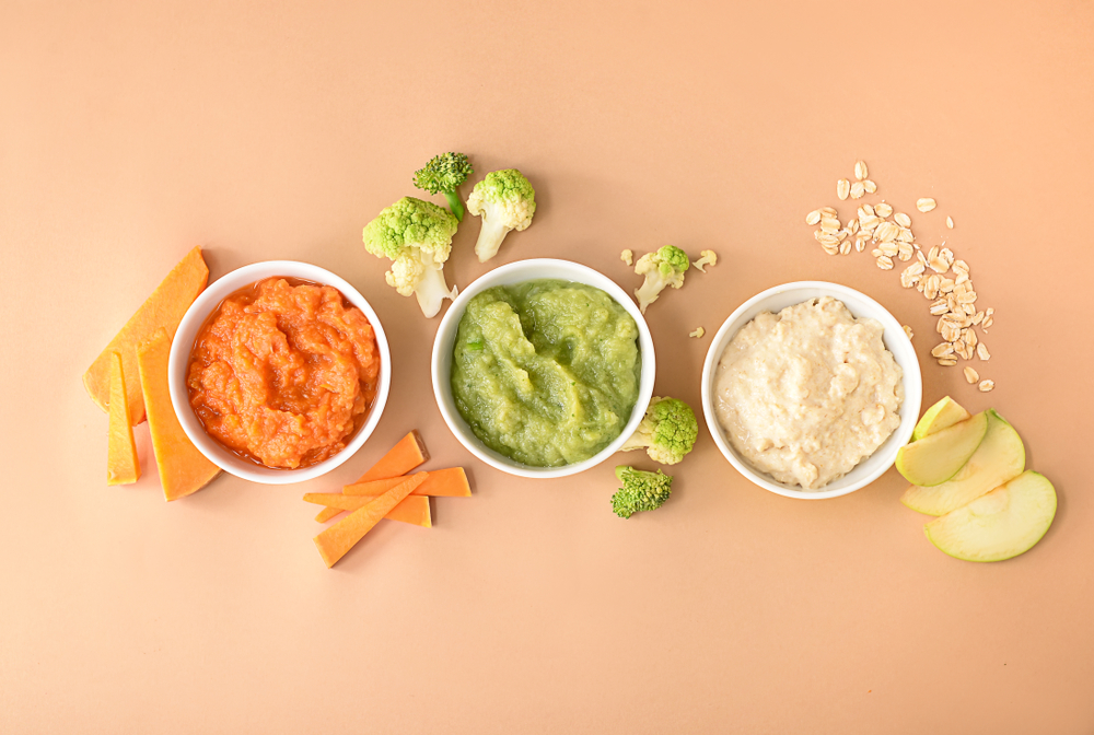 Bowls,With,Healthy,Baby,Food,On,Color,Background