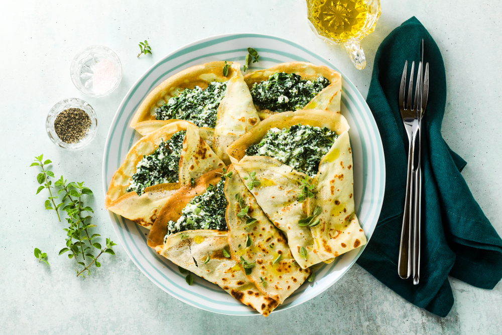 Traditional,Italian,Pancakes,Crepes,With,Spinach,And,Ricotta,On,A