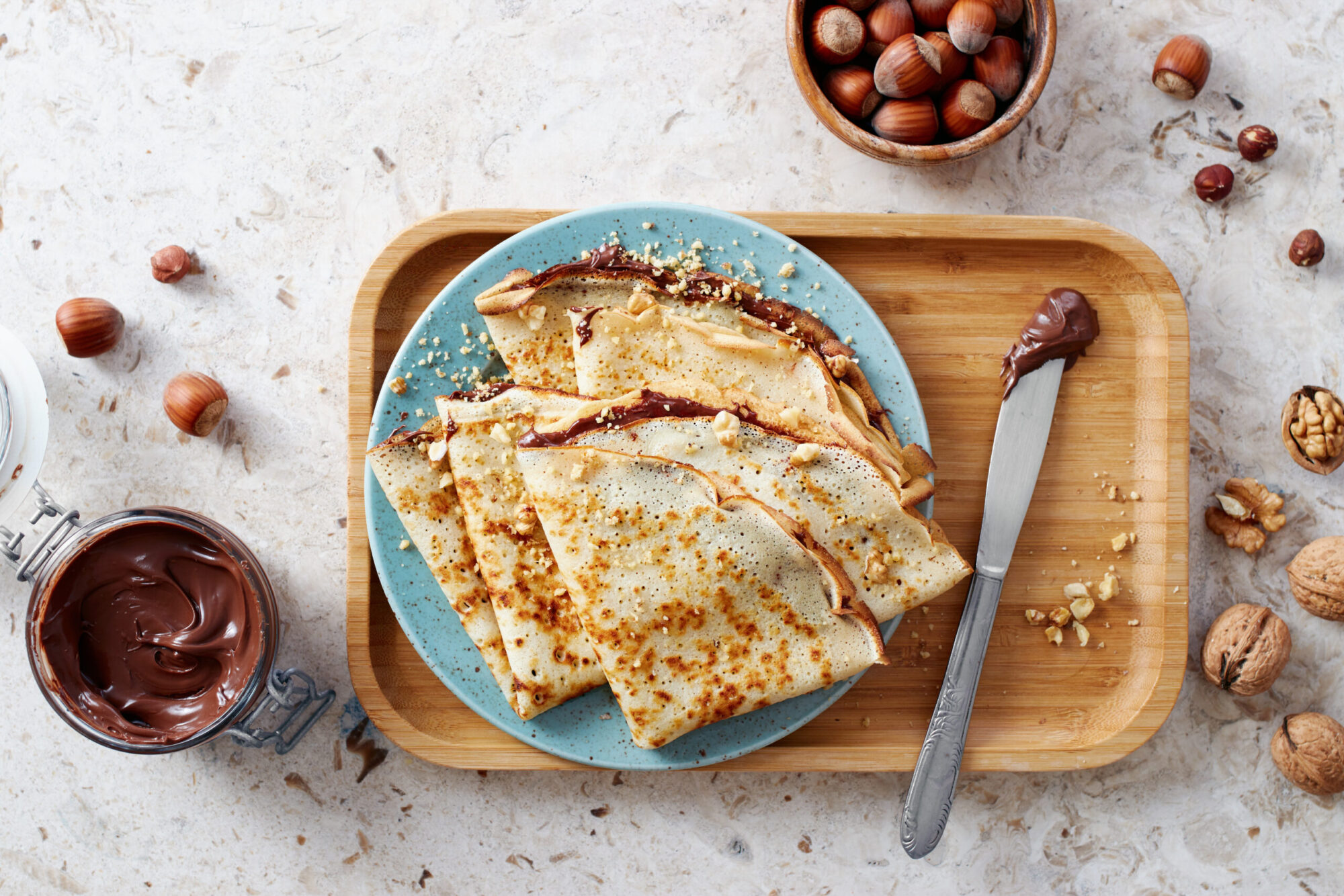 Homemade,Crepes,Tasty,Thin,Pancakes,With,Chocolate,And,Nuts.