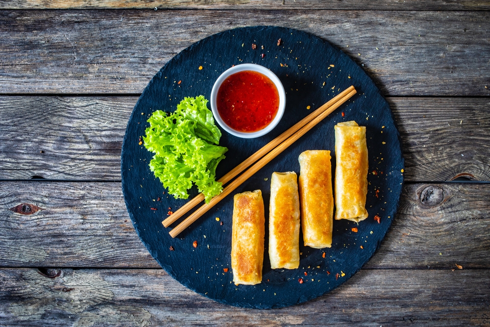 Spring,Rolls,On,Stone,Plate,On,Wooden,Table