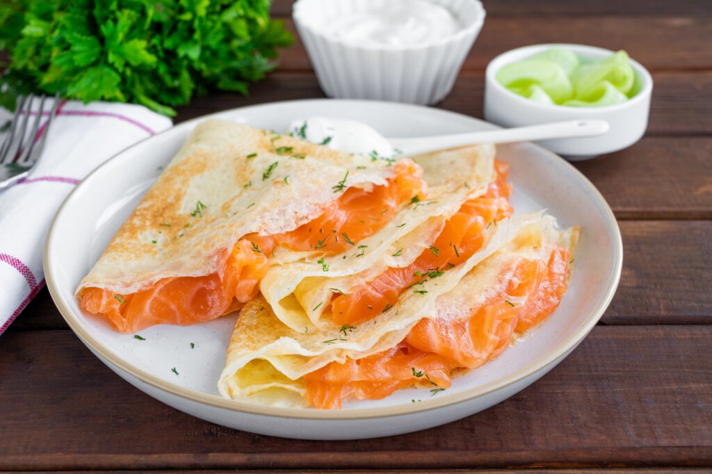 Thin,Pancakes,Or,Crepes,With,Smoked,Salmon,,Cream,Cheese,,Cucumber