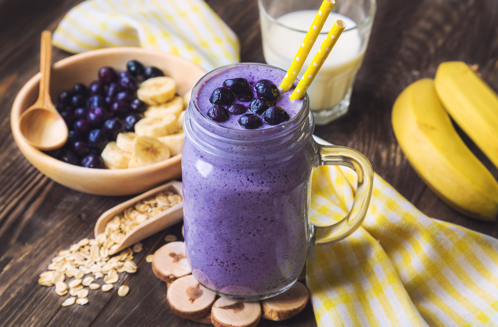 Blueberry,Smoothie,With,Banana,And,Oat,Flakes,In,Jar,On